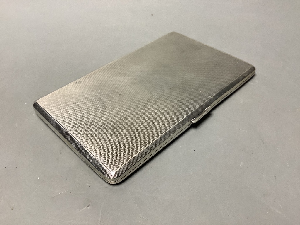 A George VI engine turned silver rectangular cigarette case, Roberts & Dore, Birmingham, 1939